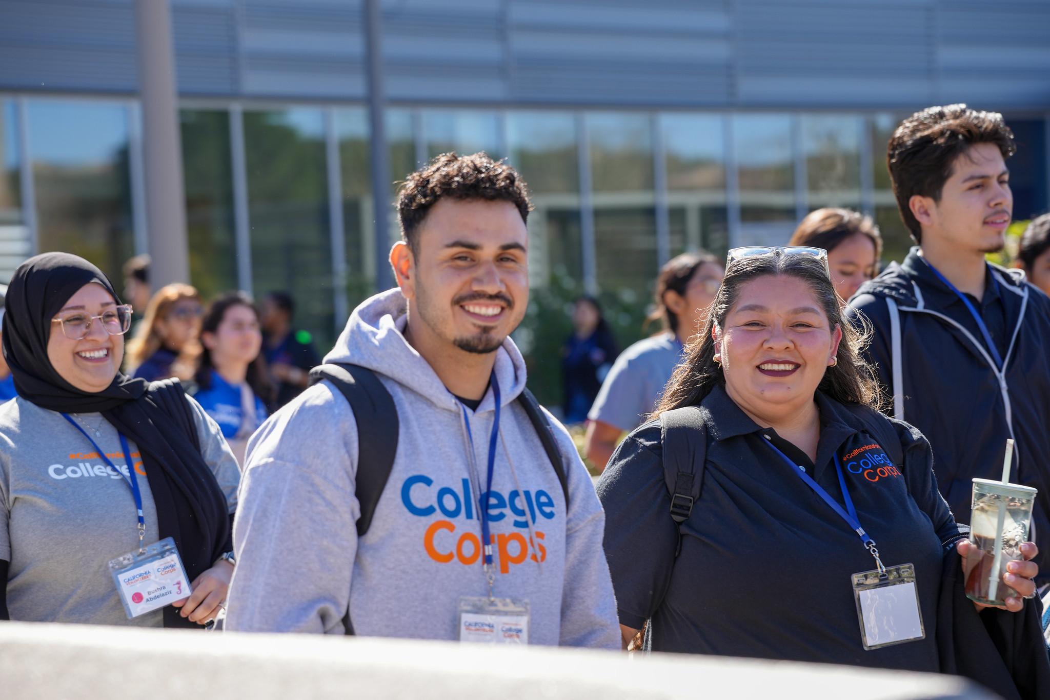 two fellows smiling at leadership event.